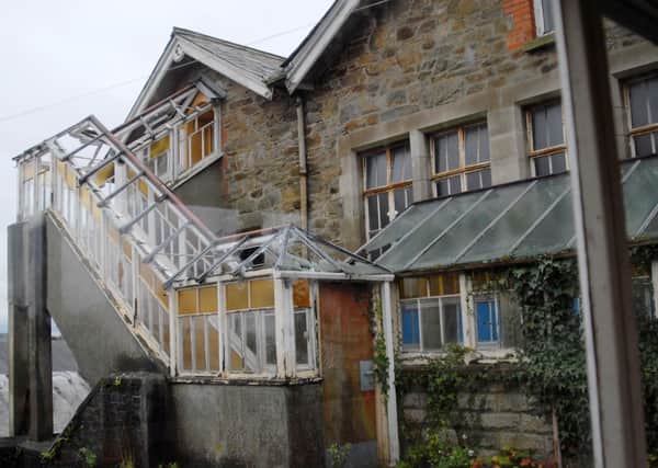 Part of the listed building pictured 11 years ago back in 2009 when it was smashed to pieces at the former Thornhill College. There have been numerous similar incidents since. 1203Ap33
