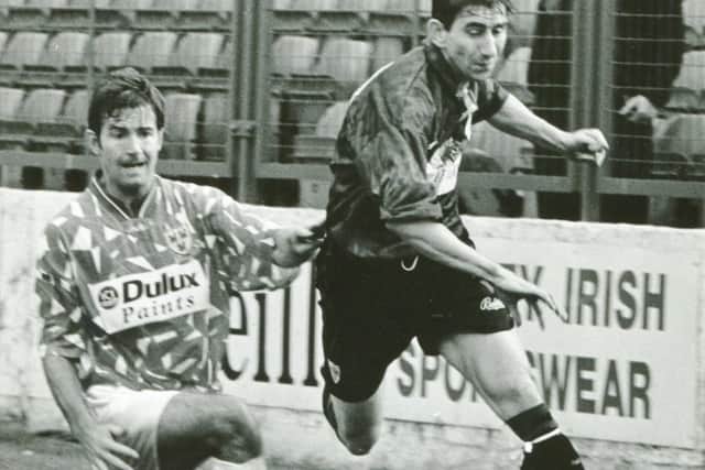 A familiar sight as 'Storky' makes his way down the wing for Derry City during the early 90s.