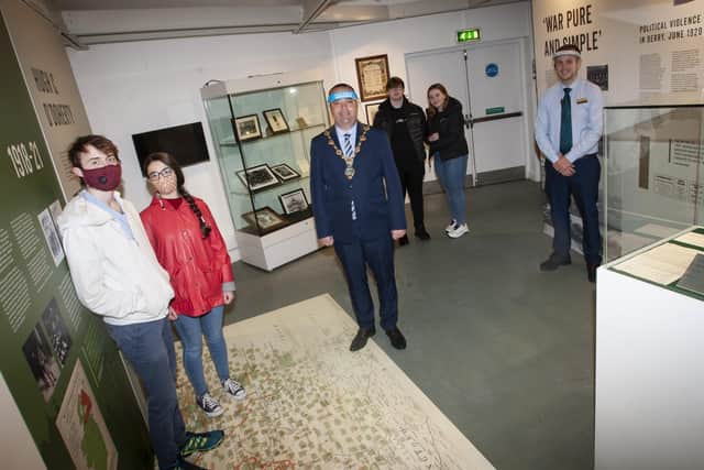 TOWER MUSEUM RE-OPENING. . . . . .The Mayor of Derry City and Strabane District Council, Brian Tierney, pictured with some of the first visitors at the Tower Museum on Tuesday morning to mark the re-opening of the building to the public after the Coronavirus Pandemic. Included on right is David Toland, DCSDC. (Photos: Jim McCafferty Photography)