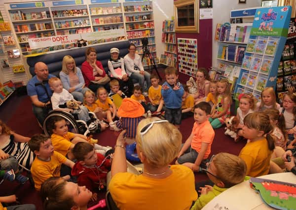 2015: Children pictured at a Little Legends Reading Room at Eason's in Foyleside. DER2615MC095
