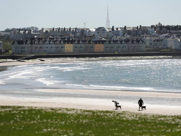 General view of a quiet West Strand beach in Portrush, Co Antrim -  

Photo by Kelvin Boyes / Press Eye.
