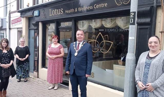 Mayor of Derry City and Strabane District Council, Cllr Brian Tierney, officially opening the Lotus Health and Wellness Centre. Left to right, Ruth O'Callaghan, UseLess Shop, Anita Jackson, therapist, Janet Quigley, centre manager, and Lisa Dawson, volunteer.
