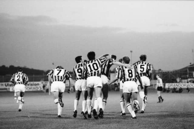 The Vitesse Arnhem players celebrate Huub Loeffens 18 minute goal during the first leg of their UEFA Cup first round clash at Brandywell Stadium