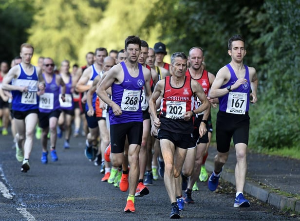 Gary Slevin, Declan Reed and Scott Rankin pictured at the front of the field during Dessie's Run last year.