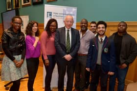 MARCH 4TH 2020: Judge Desmond Marrinan, Head of Review, pictured with members of the NW Migrant Forum, Paulette Mutiziztare, Aynaz Zarif, Lilian Seenoi-Barr, Forum Director, Tshamang Mushapo, Hyder Hasan, Yousuf Hassan and Tamal Simpson at the Review of Hate Crime Legislation Outreach Event held in the Guildhall on Wednesday evening .  DER1020GS – 010
