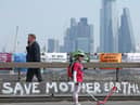 MLAs have called on Edwin Poots to introduce a Climate Change Act.