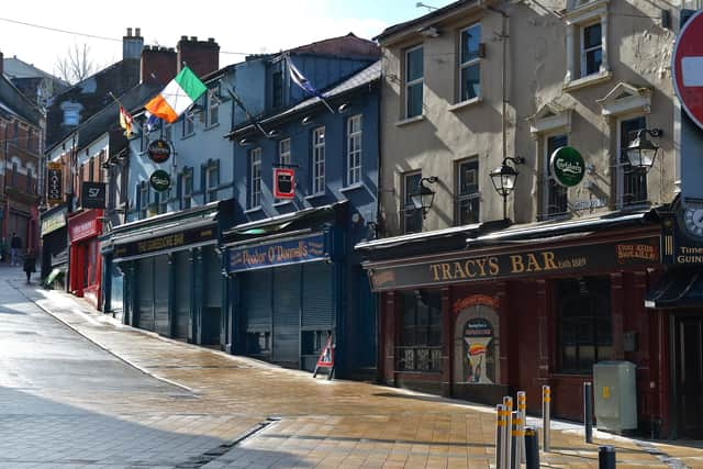 Derry's pubs were among the first businesses to close. DER1220GS - 012