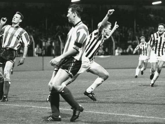 John van den Brom scores the first of his two goals against Derry City in Arnhem in 1992.
