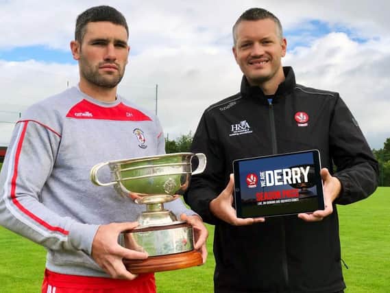 Magherafelts Danny Heavron pictured with Derry County Chairperson, Stephen Barker, at the official launch of the countys new Club Championship streaming service for 2020.