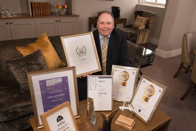 Managing Director Ciaran O’Neill is pictured with awards.
