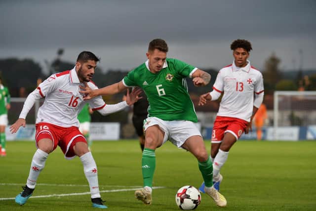 Midfielder, Jake Dunwoody representing Northern Ireland U21s.