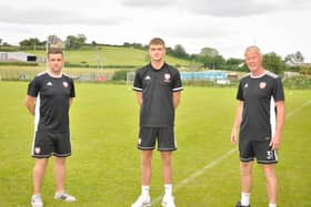 Bobby Deane with Derry City academy coaches, Mo Mahon and Donal O'Brien.