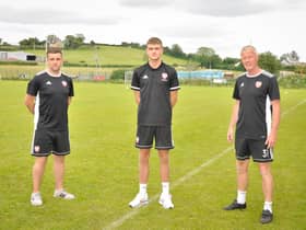 Bobby Deane with Derry City academy coaches, Mo Mahon and Donal O'Brien.