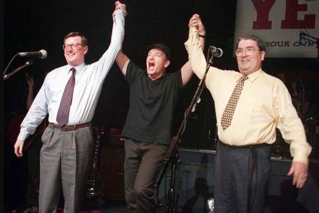 John Hume with David Trimble and Bono in 1998.