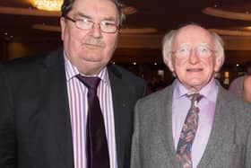 John Hume with President Michael D. Higgins in 2014.