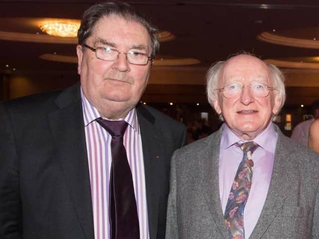 John Hume with President Michael D. Higgins in 2014.