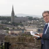 PACEMAKER PRESS BELFAST 29-05-2008: Nobel Peace Prize winner John Hume reads a book titled 'Britian & Ireland Lives Entwined II' before the launch of the book at the Verbal Arts Centre in Londonderry, Northern Ireland.