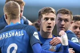 Josh Daniels can't wait to get started with Shrewsbury Town after completing his move from Glenavon.