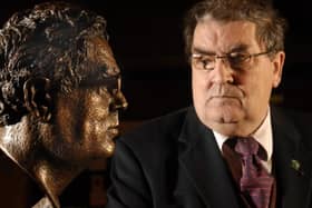 John Hume pictured with the bronze of himself by Derry Born Sculptor John Sherlock in St. Columbs College. Photo: John Harrison.