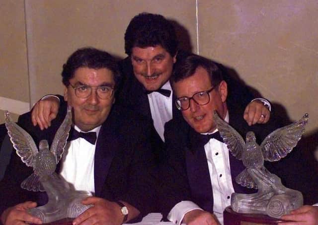 John Hume and David Trimble at a banquet in Oslo in December 1998 with John Foley, Waterford Crystal, who presented the newly awarded laureates with two hand sculpted Doves of Peace.