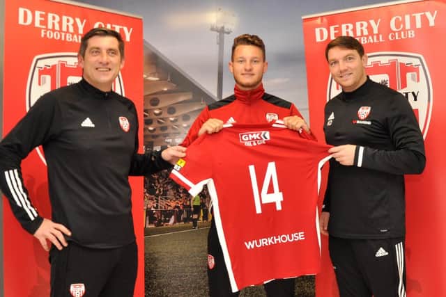 Derry City boss, Declan Devine and assistant manager, Kevin Deery alongside new signing, Jake Dunwoody who has been unable to play for his new side until his 14 day quarantine period is completed.