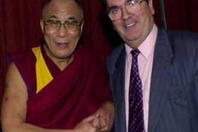 The Dalai Lama with the late John Hume.