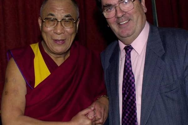 The Dalai Lama with the late John Hume.
