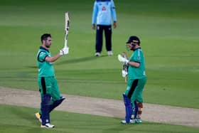 Ireland captain Andrew Balbirnie (left) celebrates reaching his century with team-mate Paul Stirling during the third One Day International match at the Ageas Bowl