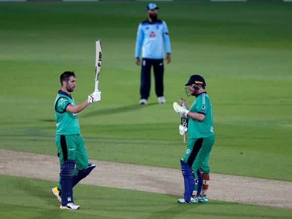 Ireland captain Andrew Balbirnie (left) celebrates reaching his century with team-mate Paul Stirling during the third One Day International match at the Ageas Bowl