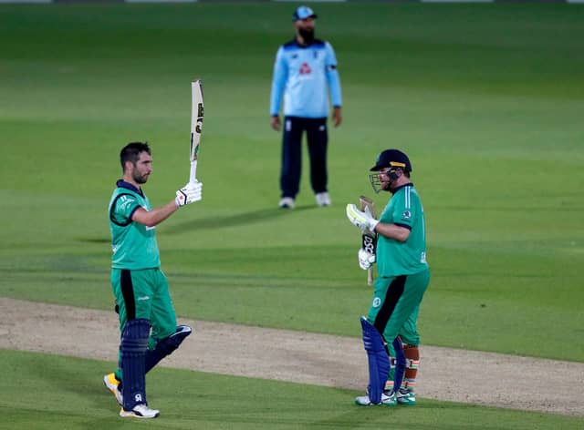 Ireland captain Andrew Balbirnie (left) celebrates reaching his century with team-mate Paul Stirling during the third One Day International match at the Ageas Bowl