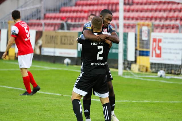 Goalscorer, James Akintunde celebrates with Colm Horgan who played a key role in the build-up to his goal.