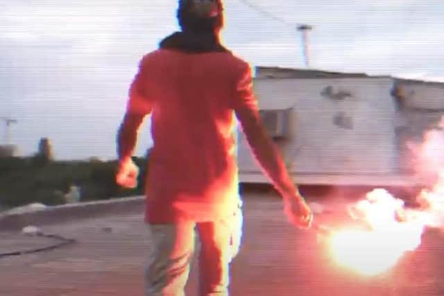 A still from the video for the new record 'Checking Out.'