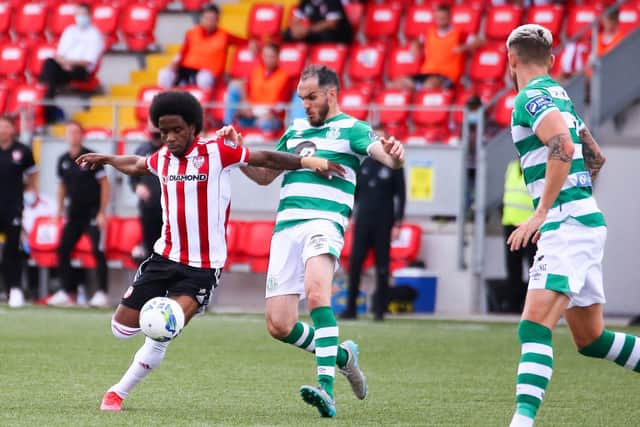 Derry goalscorer, Walter Figueira moves away from the challenge of Rovers' defender, Joey O'Brien.