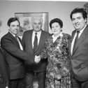 1989.... The then Mayor of Derry, Colr. Anna Gallagher, congratulates Ivor Robertson, marketing manager, Loganair, on ten years of Loganair services from Eglinton airport. On right is John Hume, MP, MEP, with, on left, Edel Arbuckle, Loganair north west sales representative, and Colr. Pat Devine, chairman, Derry City Council airport committee. (0404MM06)