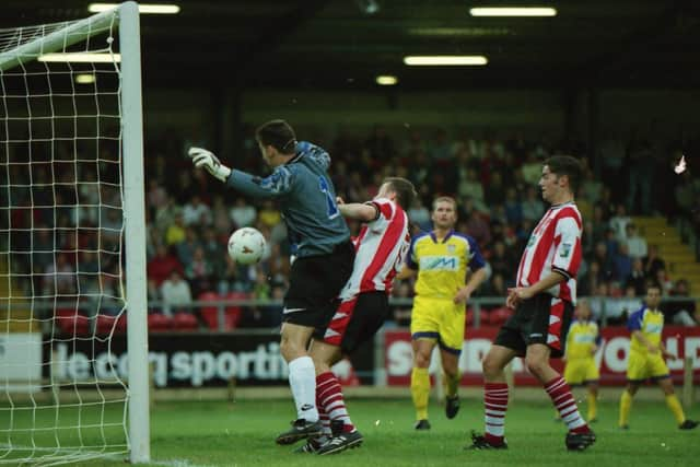 Liam Coyle is adjudged to have fouled the keeper as this attempt is disallowed.