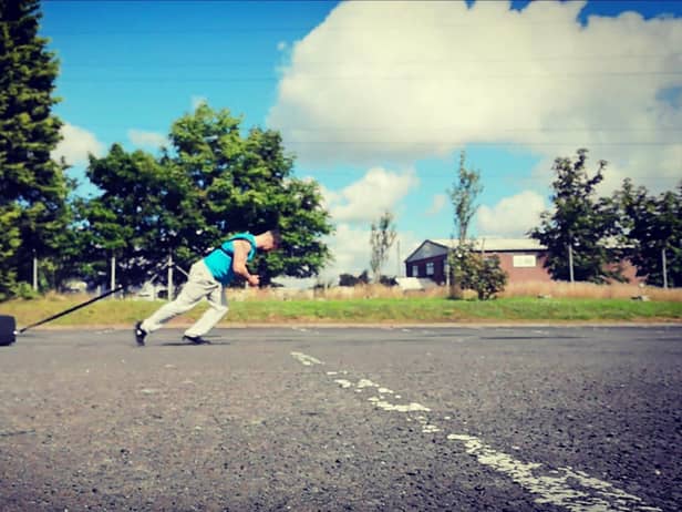 Jay Kiernan training for the tyre pull
