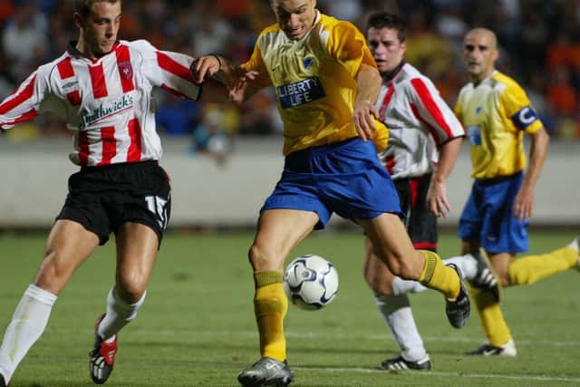 Mark McChrystal closes down the Apoel attack. Remarkably the defender is preparing to represent his hometown club in Europe at the end of the month - 16 years after the Uefa Cup clash in Nicosia.
