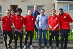 Ryan McBrides father Lexie pictured with Derry City manager Declan Devine and first team players from left to right Colm Horgan, Walter Figueira, Jack Malone, Joe Thomson and Ibrahim Meite, at the A Day for Ryan McBride held in the Brandywell area on Wednesday afternoon last.