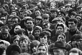 1970... John Hume among the crowd at a civil rights rally in Derry's Guldhall Square.
