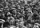 1970... John Hume among the crowd at a civil rights rally in Derry's Guldhall Square.