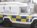 A PSNI land rover at Junior McDaid House today.