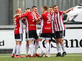 Adam Hammill celebrates scoring his first Derry City goal as the Candy Stripes take the lead against Cork.