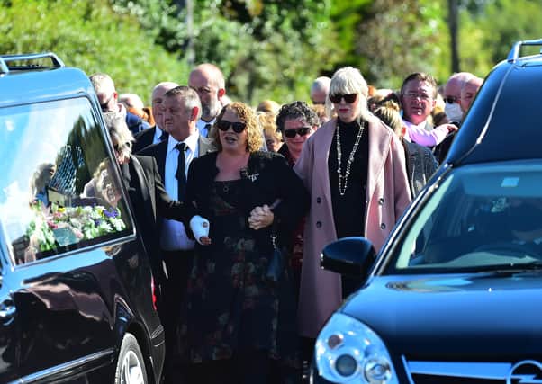 Geraldine Mullan, during The Funeral of John, Tomas and Amelia Mullan  at St Pius X Parish Church in Moville on Monday.

 .
Pic Colm Lenaghan/Pacemaker
