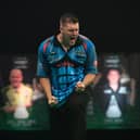 Daryl Gurney celebrates his win over Nathan Aspinall. PICTURE: Lawrence Lustig/PDC