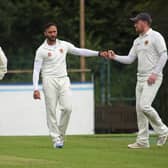 Brigade’s Iftikhar Hussain is congratulated by David Barr