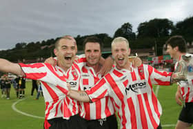 Sean Hargan, the hero in Gothenburg, celebrates the Uefa Cup victory at Brandywell with teammates, Darren Kelly and Stephen O'Flynn.