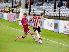 Derry City's Adam Hammill takes on the Drogheda defence during the Extratime.ie FAI Cup Second Round fixture.