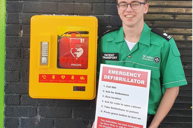 Glenn Wray, pictured with the new defibrillator.
