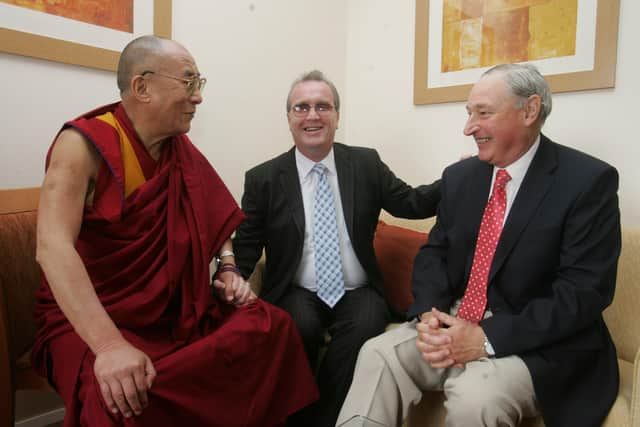 Richard and Charles Inness with the Dalai Lama.
