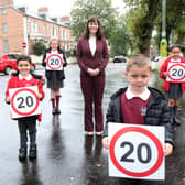 Minister Mallon with schoolchildren making the announcement. (Press Eye/Darren Kidd)